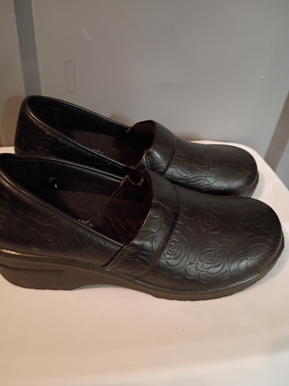 Women's Black Embossed Floral Slip-On Shoes